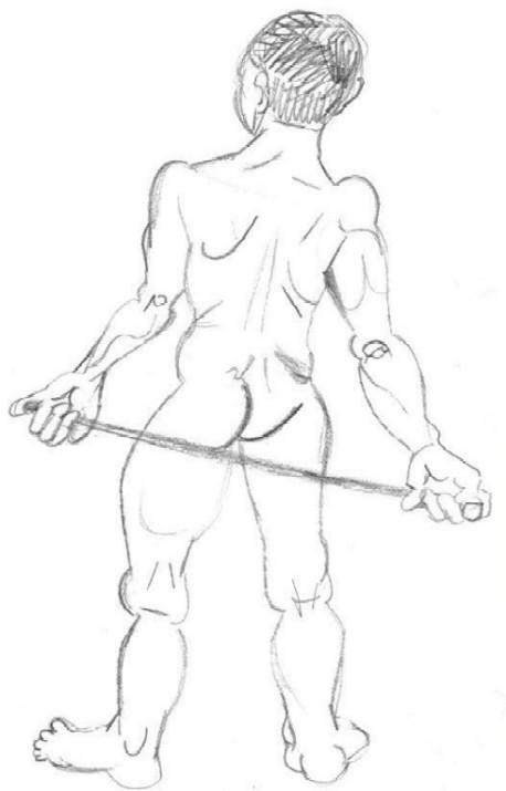 homme de dos tenant un bton par les mains